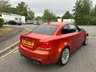 USED 2011 61 BMW 1 SERIES 3.0 1M 2d   2011 BMW 1 Series M Coupe (1M) is a modern classic and a purists dream.  1 owner from new, This ultra-rare, aggressively styled coupe pairs a 335-hp twin-turbo inline-six with a 6-speed manual and a rear-wheel-drive layout. Finding one in the launch Valencia Orange with just 5,000 miles represents a highly sought-after, appreciating investment-grade collector piece 