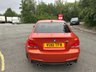 USED 2011 61 BMW 1 SERIES 3.0 1M 2d   2011 BMW 1 Series M Coupe (1M) is a modern classic and a purists dream.  1 owner from new, This ultra-rare, aggressively styled coupe pairs a 335-hp twin-turbo inline-six with a 6-speed manual and a rear-wheel-drive layout. Finding one in the launch Valencia Orange with just 5,000 miles represents a highly sought-after, appreciating investment-grade collector piece 