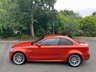 USED 2011 61 BMW 1 SERIES 3.0 1M 2d   2011 BMW 1 Series M Coupe (1M) is a modern classic and a purists dream.  1 owner from new, This ultra-rare, aggressively styled coupe pairs a 335-hp twin-turbo inline-six with a 6-speed manual and a rear-wheel-drive layout. Finding one in the launch Valencia Orange with just 5,000 miles represents a highly sought-after, appreciating investment-grade collector piece 