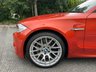 USED 2011 61 BMW 1 SERIES 3.0 1M 2d   2011 BMW 1 Series M Coupe (1M) is a modern classic and a purists dream.  1 owner from new, This ultra-rare, aggressively styled coupe pairs a 335-hp twin-turbo inline-six with a 6-speed manual and a rear-wheel-drive layout. Finding one in the launch Valencia Orange with just 5,000 miles represents a highly sought-after, appreciating investment-grade collector piece 