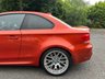 USED 2011 61 BMW 1 SERIES 3.0 1M 2d   2011 BMW 1 Series M Coupe (1M) is a modern classic and a purists dream.  1 owner from new, This ultra-rare, aggressively styled coupe pairs a 335-hp twin-turbo inline-six with a 6-speed manual and a rear-wheel-drive layout. Finding one in the launch Valencia Orange with just 5,000 miles represents a highly sought-after, appreciating investment-grade collector piece 