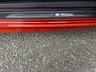 USED 2011 61 BMW 1 SERIES 3.0 1M 2d   2011 BMW 1 Series M Coupe (1M) is a modern classic and a purists dream.  1 owner from new, This ultra-rare, aggressively styled coupe pairs a 335-hp twin-turbo inline-six with a 6-speed manual and a rear-wheel-drive layout. Finding one in the launch Valencia Orange with just 5,000 miles represents a highly sought-after, appreciating investment-grade collector piece 