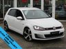 USED 2017 66 VOLKSWAGEN GOLF 2.0 GTI 5d 218 BHP Finished in PURE WHITE, with contrasting RETRO grey checked sports interior. This is a 1 owner classic HOT HATCH. Comes with LED run Lights, Convenience Pack, Heated Seats, SAT NAV, DAB, B/Tooth, Cruise, Power Folding Mirrors and Park Sensors. Performance as the name suggests is very lively and makes an Ideal quick Family Hatch. Dealer Serviced at 19170 miles, 29393 miles, 38957 miles and on arrival by EMC.