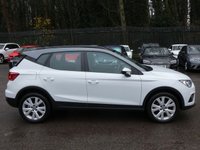 USED 2018 18 SEAT ARONA 1.0 TSI SE TECHNOLOGY DSG 5d 115 S/S 1 OWNER, FULL SERVICE HISTORY, BALANCE OF SEAT WARRANTY, SAT NAV, WIRELESS PHONE CHARGER, FULL LINK FOR APPLE CARPLAY ANDROID AUTO & MIRROR LINK, DAB RADIO, BLUETOOTH PHONE & MUSIC STREAMING, FRONT ASSIST AMBIENT TRAFFIC MONITORING, DSG AUTOMATIC GEARBOX, 17 INCH 10 SPOKE ALLOYS, REAR PARKING SENSORS WITH DISPLAY, LED DAYTIME RUNNING LIGHTS, AUTO LIGHTS, LEATHER MULTIFUNCTION STEERING WHEEL, CRUISE CONTROL, SPEED LIMITER, AIR COND, AUX INPUT, 2x USB PORTS, CD PLAYER, 2x SD CARD READERS, VAT Q