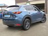 USED 2019 69 MAZDA CX-5 2.0 SE-L NAV PLUS 5d 163 BHP Finished in ETERNAL BLUE PEARL with contrasting Dark Grey cloth trim. This Mazda really is one of the best large family cars to drive. The Mazda CX-5's smart exterior is mirrored by its well-equipped cabin. Features include, Sat Nav, DAB Radio, B/Tooth, Front and Rear Park Sensors and much more. Just serviced and still under Mazda Warranty.