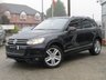 USED 2012 12 VOLKSWAGEN TOUAREG 3.0 V6 ALTITUDE TDI BLUEMOTION TECHNOLOGY 5d 242 BHP Finished in DEEP BLACK PEARL with contrasting HEATED EBONY LEATHER TRIM. This is a luxurious family car that is as good off road as it is on. It is spacious, comfortable and great to drive. Features include Sat Nav, B/Tooth, Park sensors, 360 Surround Cameras, Deployable Tow Bar, Air Suspension, Heated Leather, DAB, 20" Alloys and much more. VW serviced at 8575 miles, 19245 miles, 25690 miles, 29827 miles, 34695 miles, 44621 miles, 56547 miles, and at 63939 miles on 6/10/2020.