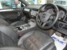 USED 2012 12 VOLKSWAGEN TOUAREG 3.0 V6 ALTITUDE TDI BLUEMOTION TECHNOLOGY 5d 242 BHP Finished in DEEP BLACK PEARL with contrasting HEATED EBONY LEATHER TRIM. This is a luxurious family car that is as good off road as it is on. It is spacious, comfortable and great to drive. Features include Sat Nav, B/Tooth, Park sensors, 360 Surround Cameras, Deployable Tow Bar, Air Suspension, Heated Leather, DAB, 20" Alloys and much more. VW serviced at 8575 miles, 19245 miles, 25690 miles, 29827 miles, 34695 miles, 44621 miles, 56547 miles, and at 63939 miles on 6/10/2020.