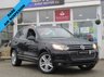 USED 2012 12 VOLKSWAGEN TOUAREG 3.0 V6 ALTITUDE TDI BLUEMOTION TECHNOLOGY 5d 242 BHP Finished in DEEP BLACK PEARL with contrasting HEATED EBONY LEATHER TRIM. This is a luxurious family car that is as good off road as it is on. It is spacious, comfortable and great to drive. Features include Sat Nav, B/Tooth, Park sensors, 360 Surround Cameras, Deployable Tow Bar, Air Suspension, Heated Leather, DAB, 20" Alloys and much more. VW serviced at 8575 miles, 19245 miles, 25690 miles, 29827 miles, 34695 miles, 44621 miles, 56547 miles, and at 63939 miles on 6/10/2020.