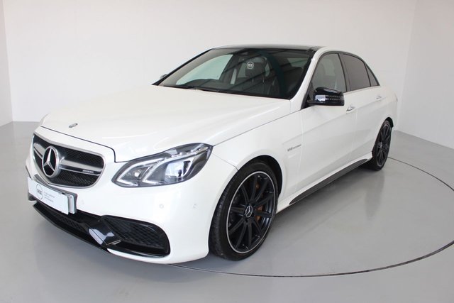 2015 15 Mercedes-Benz E-Class 5.5 E63 AMG S 4d AUTO 585 BHP-DIAMOND WHITE-FANTASTIC SPEC-CARBON CERAMIC BRAKES-TRACK PACKAGE-PANORAMIC SUNROOF-DYNAMIC LUMBAR SUPPORT-HEATED FRONT AND REAR SEATS-COOLED FRONT SEATS-BLACK NAPPA LEATHER-HARMAN KARDON,