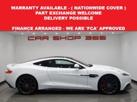 USED 2014 14 ASTON MARTIN VANQUISH 5.9 V12 (565 BHP) TOUCHTRONIC AUTO (2+2)  COUPE 2DR..CARBON..STRATUS WHITE METALLIC..BANG AND OLUFSEN..E/M/HEATED LEATHERS..RED STITCH..R/CAMERA..CERAMIC BRAKES STRATUS WHITE+CARBON+R/CAM+NAV+BANG & OLUFSEN