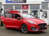 USED 2020 20 FORD FIESTA 1.5 ST-3 5d 198 BHP Finished in RACE RED  with contrasting EBONY SPORTS  LEATHER interior trim. It is impossible to ignore that this is one seriously fun car. If you are after some old-school hot hatch fun, the ST is hard to beat. Punching out just under 200 BHP faster than the old model. Features include SAT NAV, Cruise Control, Climate, Heated Seats, DAB, B/Tooth, LED day Lights, 2 Keys and much more. This Fiesta is a small car that you can really enjoy driving.