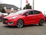 USED 2020 20 FORD FIESTA 1.5 ST-3 5d 198 BHP Finished in RACE RED  with contrasting EBONY SPORTS  LEATHER interior trim. It is impossible to ignore that this is one seriously fun car. If you are after some old-school hot hatch fun, the ST is hard to beat. Punching out just under 200 BHP faster than the old model. Features include SAT NAV, Cruise Control, Climate, Heated Seats, DAB, B/Tooth, LED day Lights, 2 Keys and much more. This Fiesta is a small car that you can really enjoy driving.