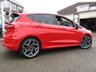 USED 2020 20 FORD FIESTA 1.5 ST-3 5d 198 BHP Finished in RACE RED  with contrasting EBONY SPORTS  LEATHER interior trim. It is impossible to ignore that this is one seriously fun car. If you are after some old-school hot hatch fun, the ST is hard to beat. Punching out just under 200 BHP faster than the old model. Features include SAT NAV, Cruise Control, Climate, Heated Seats, DAB, B/Tooth, LED day Lights, 2 Keys and much more. This Fiesta is a small car that you can really enjoy driving.
