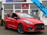 USED 2020 20 FORD FIESTA 1.5 ST-3 5d 198 BHP Finished in RACE RED  with contrasting EBONY SPORTS  LEATHER interior trim. It is impossible to ignore that this is one seriously fun car. If you are after some old-school hot hatch fun, the ST is hard to beat. Punching out just under 200 BHP faster than the old model. Features include SAT NAV, Cruise Control, Climate, Heated Seats, DAB, B/Tooth, LED day Lights, 2 Keys and much more. This Fiesta is a small car that you can really enjoy driving.