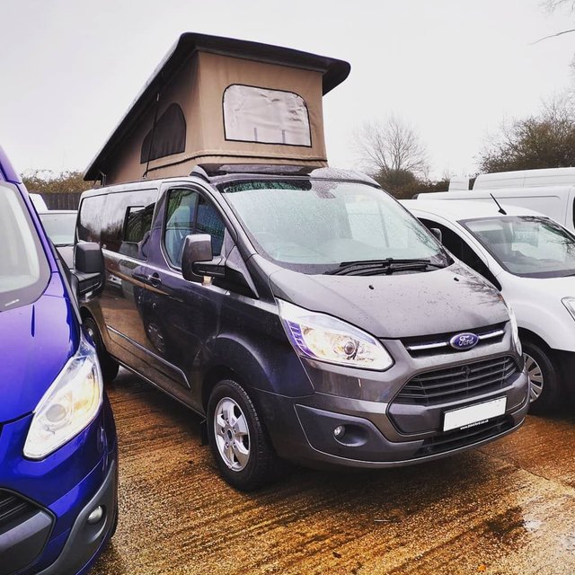 ford dealership used vans