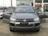 USED 2013 63 VOLKSWAGEN TOUAREG 3.0 V6 R-LINE TDI BLUEMOTION TECHNOLOGY 5d 242 BHP Finished in CANYON GREY Metallic with contrasting HEATED EBONY LEATHER TRIM. This is a luxurious family car that is as good off road as it is on. It is spacious, comfortable and great to drive. Features include Sat Nav, Pan Roof, B/Tooth, Park sensors, Heated Leather, DAB, 20" Alloys and much more. Dealer Serviced at 15717 miles, 25550 miles, 39001 miles, and at 46416 miles.