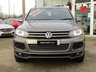 USED 2013 63 VOLKSWAGEN TOUAREG 3.0 V6 R-LINE TDI BLUEMOTION TECHNOLOGY 5d 242 BHP Finished in CANYON GREY Metallic with contrasting HEATED EBONY LEATHER TRIM. This is a luxurious family car that is as good off road as it is on. It is spacious, comfortable and great to drive. Features include Sat Nav, Pan Roof, B/Tooth, Park sensors, Heated Leather, DAB, 20" Alloys and much more. Dealer Serviced at 15717 miles, 25550 miles, 39001 miles, and at 46416 miles.
