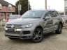 USED 2013 63 VOLKSWAGEN TOUAREG 3.0 V6 R-LINE TDI BLUEMOTION TECHNOLOGY 5d 242 BHP Finished in CANYON GREY Metallic with contrasting HEATED EBONY LEATHER TRIM. This is a luxurious family car that is as good off road as it is on. It is spacious, comfortable and great to drive. Features include Sat Nav, Pan Roof, B/Tooth, Park sensors, Heated Leather, DAB, 20" Alloys and much more. Dealer Serviced at 15717 miles, 25550 miles, 39001 miles, and at 46416 miles.
