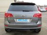 USED 2013 63 VOLKSWAGEN TOUAREG 3.0 V6 R-LINE TDI BLUEMOTION TECHNOLOGY 5d 242 BHP Finished in CANYON GREY Metallic with contrasting HEATED EBONY LEATHER TRIM. This is a luxurious family car that is as good off road as it is on. It is spacious, comfortable and great to drive. Features include Sat Nav, Pan Roof, B/Tooth, Park sensors, Heated Leather, DAB, 20" Alloys and much more. Dealer Serviced at 15717 miles, 25550 miles, 39001 miles, and at 46416 miles.