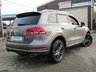 USED 2013 63 VOLKSWAGEN TOUAREG 3.0 V6 R-LINE TDI BLUEMOTION TECHNOLOGY 5d 242 BHP Finished in CANYON GREY Metallic with contrasting HEATED EBONY LEATHER TRIM. This is a luxurious family car that is as good off road as it is on. It is spacious, comfortable and great to drive. Features include Sat Nav, Pan Roof, B/Tooth, Park sensors, Heated Leather, DAB, 20" Alloys and much more. Dealer Serviced at 15717 miles, 25550 miles, 39001 miles, and at 46416 miles.