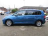 USED 2018 68 VOLKSWAGEN TOURAN 1.6 SE TDI DSG 5d 114 BHP Finished in CARIBBEAN BLUE METALLIC with contrasting Grey Trim. This Touran is a practical family car that has lots of space, seven seats and a huge array of storage areas. It has great back seat picnic tables with cup holders that lock in place. Features include, DAB Radio, Alloy wheels, B/Tooth, Park Sensors and much more. Dealer serviced and still under VW Warranty until Nov 2021.