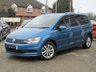 USED 2018 68 VOLKSWAGEN TOURAN 1.6 SE TDI DSG 5d 114 BHP Finished in CARIBBEAN BLUE METALLIC with contrasting Grey Trim. This Touran is a practical family car that has lots of space, seven seats and a huge array of storage areas. It has great back seat picnic tables with cup holders that lock in place. Features include, DAB Radio, Alloy wheels, B/Tooth, Park Sensors and much more. Dealer serviced and still under VW Warranty until Nov 2021.