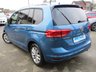 USED 2018 68 VOLKSWAGEN TOURAN 1.6 SE TDI DSG 5d 114 BHP Finished in CARIBBEAN BLUE METALLIC with contrasting Grey Trim. This Touran is a practical family car that has lots of space, seven seats and a huge array of storage areas. It has great back seat picnic tables with cup holders that lock in place. Features include, DAB Radio, Alloy wheels, B/Tooth, Park Sensors and much more. Dealer serviced and still under VW Warranty until Nov 2021.