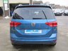 USED 2018 68 VOLKSWAGEN TOURAN 1.6 SE TDI DSG 5d 114 BHP Finished in CARIBBEAN BLUE METALLIC with contrasting Grey Trim. This Touran is a practical family car that has lots of space, seven seats and a huge array of storage areas. It has great back seat picnic tables with cup holders that lock in place. Features include, DAB Radio, Alloy wheels, B/Tooth, Park Sensors and much more. Dealer serviced and still under VW Warranty until Nov 2021.