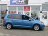 USED 2018 68 VOLKSWAGEN TOURAN 1.6 SE TDI DSG 5d 114 BHP Finished in CARIBBEAN BLUE METALLIC with contrasting Grey Trim. This Touran is a practical family car that has lots of space, seven seats and a huge array of storage areas. It has great back seat picnic tables with cup holders that lock in place. Features include, DAB Radio, Alloy wheels, B/Tooth, Park Sensors and much more. Dealer serviced and still under VW Warranty until Nov 2021.