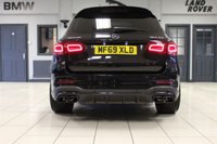 USED 2019 69 MERCEDES-BENZ GLC-CLASS 4.0 AMG GLC 63 4MATIC PLUS PREMIUM 5d 469 BHP FINISHED IN STUNNING METALLIC OBSIDIAN BLACK, COMPLIMENTED BY BLACK, NAPPA LEATHER, ELECTRICALLY ADJUSTABLE, MEMORY PROGRAMME HEATED SEATS AND CARBON FIBRE INTERIOR TRIM UPGRADE + BEAUTIFUL, 1 OWNER, NEW SHAPE GLC PREMIUM PLUS, COMES WITH A FULL MERCEDES MAIN DEALER SERVICE HISTORY AND WITH THE BALANCE OF MERCEDES MANUFACTURERS WARRANTY UNTIL SEPTEMBER 2022 + PANORAMIC GLASS SLIDING SUNROOF + WIDESCREEN VIRTUAL COCKPIT DIGITAL DASH DISPLAY + SATELLITE NAVIGATION + 360 DEGREE CAMERA + BLUETOOTH P