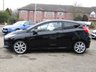 USED 2013 63 FORD FIESTA 1.0 ZETEC S 3d 124 BHP Finished in SHADOW BLACK with contrasting GREY SPORTS Cloth interior trim. This Fiesta is a small car that you can really enjoy driving. Economical and cheap to run, stylish to look at and some great features including ZERO Road Tax, B/Tooth, 17"Alloys, Air Con and much more, makes this a must for the first time driver or small family. Dealer Serviced at 6540 miles, 19893 miles, 29668 miles, 32603 miles, 51402 miles, 65332 miles and on arrival at 77841 miles. . 12 Months MOT.