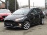USED 2013 63 FORD FIESTA 1.0 ZETEC S 3d 124 BHP Finished in SHADOW BLACK with contrasting GREY SPORTS Cloth interior trim. This Fiesta is a small car that you can really enjoy driving. Economical and cheap to run, stylish to look at and some great features including ZERO Road Tax, B/Tooth, 17"Alloys, Air Con and much more, makes this a must for the first time driver or small family. Dealer Serviced at 6540 miles, 19893 miles, 29668 miles, 32603 miles, 51402 miles, 65332 miles and on arrival at 77841 miles. . 12 Months MOT.