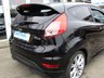 USED 2013 63 FORD FIESTA 1.0 ZETEC S 3d 124 BHP Finished in SHADOW BLACK with contrasting GREY SPORTS Cloth interior trim. This Fiesta is a small car that you can really enjoy driving. Economical and cheap to run, stylish to look at and some great features including ZERO Road Tax, B/Tooth, 17"Alloys, Air Con and much more, makes this a must for the first time driver or small family. Dealer Serviced at 6540 miles, 19893 miles, 29668 miles, 32603 miles, 51402 miles, 65332 miles and on arrival at 77841 miles. . 12 Months MOT.