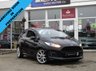 USED 2013 63 FORD FIESTA 1.0 ZETEC S 3d 124 BHP Finished in SHADOW BLACK with contrasting GREY SPORTS Cloth interior trim. This Fiesta is a small car that you can really enjoy driving. Economical and cheap to run, stylish to look at and some great features including ZERO Road Tax, B/Tooth, 17"Alloys, Air Con and much more, makes this a must for the first time driver or small family. Dealer Serviced at 6540 miles, 19893 miles, 29668 miles, 32603 miles, 51402 miles, 65332 miles and on arrival at 77841 miles. . 12 Months MOT.