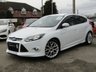 USED 2014 14 FORD FOCUS 1.0 ZETEC S S/S 5d 124 BHP Finished in FROZEN WHITE METALLIC with contrasting Grey Cloth Sports trim. This is a modern day peoples car. It is a reliable, practical and affordable vehicle that is liked by everyone. Great features which include Appearance Pack, Tinted windows, 18" Alloys, DAB radio, Heated Front Screen, Rear Parking Sensors, Front Fogs, Air Con and much more. Dealer serviced at 11017 miles, 17967 miles, 25697 miles, 28956 miles, 33639 miles and recently at 35777 miles. 12 Months MOT.