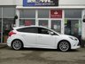 USED 2014 14 FORD FOCUS 1.0 ZETEC S S/S 5d 124 BHP Finished in FROZEN WHITE METALLIC with contrasting Grey Cloth Sports trim. This is a modern day peoples car. It is a reliable, practical and affordable vehicle that is liked by everyone. Great features which include Appearance Pack, Tinted windows, 18" Alloys, DAB radio, Heated Front Screen, Rear Parking Sensors, Front Fogs, Air Con and much more. Dealer serviced at 11017 miles, 17967 miles, 25697 miles, 28956 miles, 33639 miles and recently at 35777 miles. 12 Months MOT.