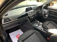 USED 2017 17 BMW 3 SERIES 1.5 318I SPORT TOURING 5d 135 BHP STUNNING BMW 318i SPORT TOURING  AUTOMATIC/STEP, with 'SATELLITE-NAVIGATION ' 1 OWNER CAR (ex-motability) HAVING COVERED ONLY 32,664 MILES FROM BRAND NEW WITH HISTORY, FINISHED IN SAPPHIRE BLACK METALLIC WITH GREY SPORTS INTERIOR. HUGE SPECIFICATION (SEE LIST) AND HUGE SAVING ON NEW.