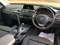 USED 2017 17 BMW 3 SERIES 1.5 318I SPORT TOURING 5d 135 BHP STUNNING BMW 318i SPORT TOURING  AUTOMATIC/STEP, with 'SATELLITE-NAVIGATION ' 1 OWNER CAR (ex-motability) HAVING COVERED ONLY 32,664 MILES FROM BRAND NEW WITH HISTORY, FINISHED IN SAPPHIRE BLACK METALLIC WITH GREY SPORTS INTERIOR. HUGE SPECIFICATION (SEE LIST) AND HUGE SAVING ON NEW.