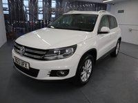 USED 2013 13 VOLKSWAGEN TIGUAN 1.4 SE TSI BLUEMOTION TECHNOLOGY 5d 158 BHP TALL RIDING CROSSOVER COMBINES THE USABILITY OF THE GOLF.