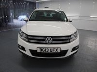 USED 2013 13 VOLKSWAGEN TIGUAN 1.4 SE TSI BLUEMOTION TECHNOLOGY 5d 158 BHP TALL RIDING CROSSOVER COMBINES THE USABILITY OF THE GOLF.
