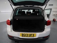 USED 2013 13 VOLKSWAGEN TIGUAN 1.4 SE TSI BLUEMOTION TECHNOLOGY 5d 158 BHP TALL RIDING CROSSOVER COMBINES THE USABILITY OF THE GOLF.