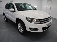 USED 2013 13 VOLKSWAGEN TIGUAN 1.4 SE TSI BLUEMOTION TECHNOLOGY 5d 158 BHP TALL RIDING CROSSOVER COMBINES THE USABILITY OF THE GOLF.