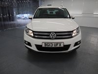 USED 2013 13 VOLKSWAGEN TIGUAN 1.4 SE TSI BLUEMOTION TECHNOLOGY 5d 158 BHP TALL RIDING CROSSOVER COMBINES THE USABILITY OF THE GOLF.