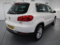 USED 2013 13 VOLKSWAGEN TIGUAN 1.4 SE TSI BLUEMOTION TECHNOLOGY 5d 158 BHP TALL RIDING CROSSOVER COMBINES THE USABILITY OF THE GOLF.