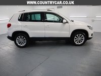 USED 2013 13 VOLKSWAGEN TIGUAN 1.4 SE TSI BLUEMOTION TECHNOLOGY 5d 158 BHP TALL RIDING CROSSOVER COMBINES THE USABILITY OF THE GOLF.