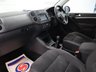 USED 2013 13 VOLKSWAGEN TIGUAN 1.4 SE TSI BLUEMOTION TECHNOLOGY 5d 158 BHP TALL RIDING CROSSOVER COMBINES THE USABILITY OF THE GOLF.