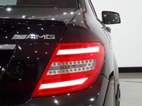 USED 2012 12 MERCEDES-BENZ C-CLASS 6.2 C63 AMG EDITION 125 / AMG PERFORMANCE PACK (487 BHP) MCT 7S 4DR + NAV + HARMAN KARDON + E/M/HEATED DESIGNO 2 TONE LEATHERS + E/SUNROOF + XENON-LEDS + R/CAMERA + PARKTRONIC + PRIVACY + 19S AMG PERFORMANCE PACK+DESIGNO 2 TONE LEATHERS+CAM+HK