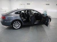 USED 2014 14 AUDI A5 2.0 SPORTBACK TDI SE TECHNIK 5d 134 BHP WITH OPTIONAL EXTRAS OF HEATED FRONT SEATS AND METALLIC FINISH ITS STANDS OUT FROM YOUR STANDARD A5.THE SPORTBACK IS A 5 DOOR SALOON WITH A HATCHBACK TAILAGTE. THE AUDI A5 HAS EXCELLENT BUILD AND RELIABILITY QUALITIES