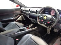 USED 2018 18 FERRARI PORTOFINO 3.9 BCA 2d 592 BHP THIS INCREDIBLE CONVERTIBLE GRAND TOURER SPORTS CAR COMES IN IMMACULATE ROSSO RED WITH NERO ELECTRICALLY RETRACTIBLE HARD TOP, THE BEAUTIFUL 3.9L TWIN TURBO ITALIAN V8 UNDER THE HOOD PRODUCES AN PHENOMENAL 592 BHP SLINGSHOTING YOU FROM 0-60 IN A STAGGERING 3.5 SECONDS AND WITH A TOP SPEED OF 199MPH YOU REALLY WILL FEEL THE WIND IN YOUR HAIR, THE HANDCRAFTED BLACK ITALIAN LEATHER INTERIOR WITH COLOUR MATCHED ROSSO STITCHING WILL GET YOU THERE IN COMFORT AND STYLE. THE CAR COMES WITH ALL THE MODER