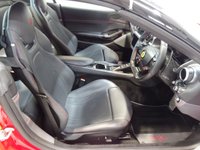 USED 2018 18 FERRARI PORTOFINO 3.9 BCA 2d 592 BHP THIS INCREDIBLE CONVERTIBLE GRAND TOURER SPORTS CAR COMES IN IMMACULATE ROSSO RED WITH NERO ELECTRICALLY RETRACTIBLE HARD TOP, THE BEAUTIFUL 3.9L TWIN TURBO ITALIAN V8 UNDER THE HOOD PRODUCES AN PHENOMENAL 592 BHP SLINGSHOTING YOU FROM 0-60 IN A STAGGERING 3.5 SECONDS AND WITH A TOP SPEED OF 199MPH YOU REALLY WILL FEEL THE WIND IN YOUR HAIR, THE HANDCRAFTED BLACK ITALIAN LEATHER INTERIOR WITH COLOUR MATCHED ROSSO STITCHING WILL GET YOU THERE IN COMFORT AND STYLE. THE CAR COMES WITH ALL THE MODER